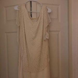 Beautiful white pearl dress tags on. Never used.